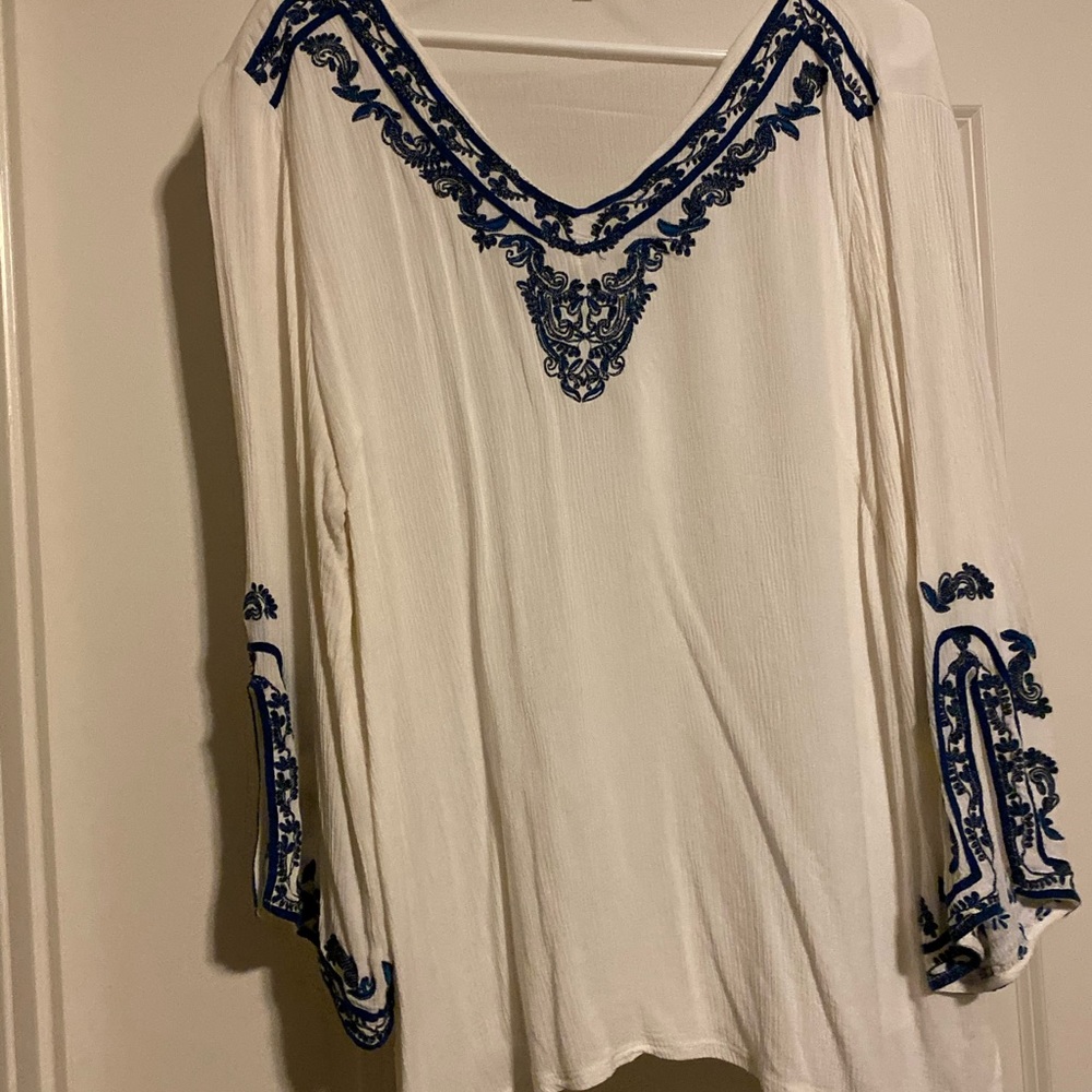 White and navy blouse with navy detailing